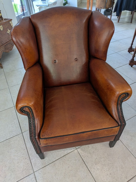 A sheepskin leather wingback armchair in very good condition – lounge Atlier, Metal (photo 2 of 10)