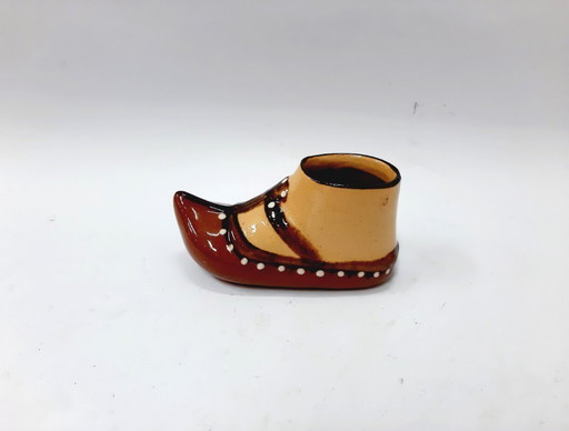 Scarpa vintage in ceramica smaltata