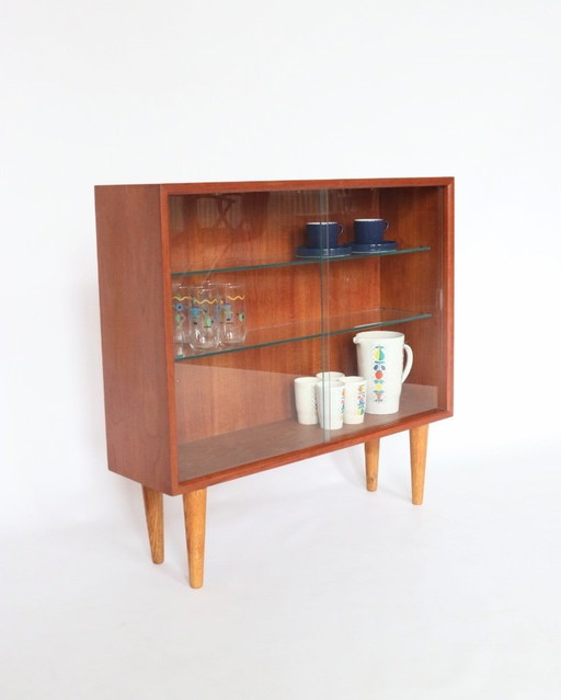 Librería vintage de teca, vitrina, muebles retro.