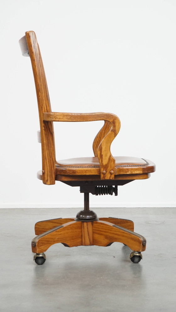 Image 1 of Cognac Colored Leather Office Chair on Wheels with Wood and a Wicker Matted Backrest