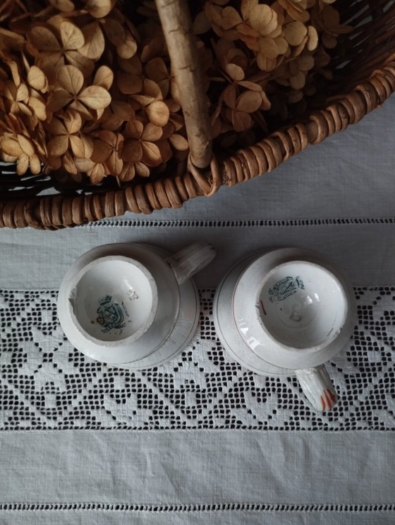 Image 1 of Een paar Sarreguemines ondoorzichtige porseleinen vuurkorfjes (1857-1900)