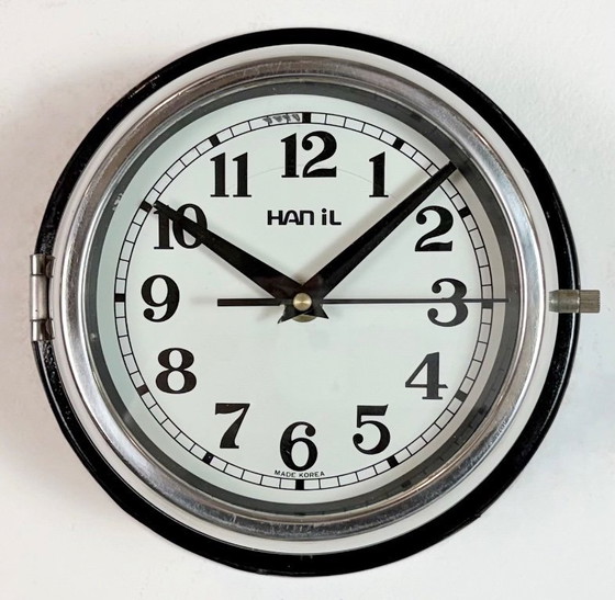 Image 1 of Vintage zwarte Hanil scheepswandklok, jaren 80