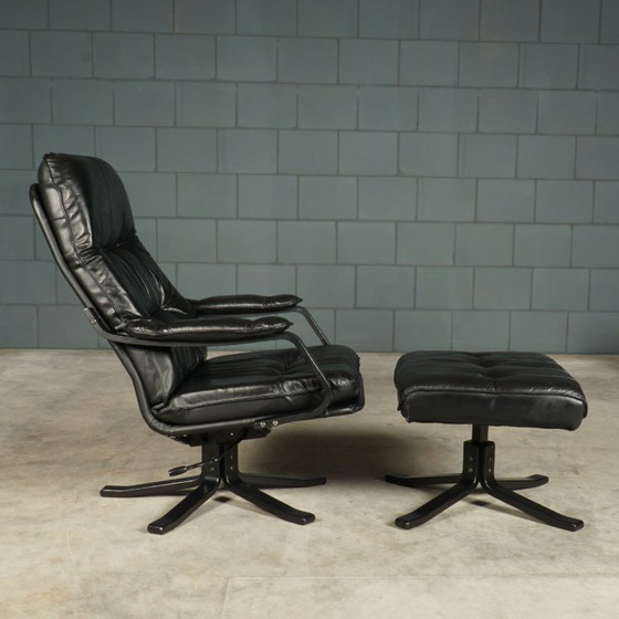 Image 1 of Vintage Unico draaifauteuil met hocker – jaren 70