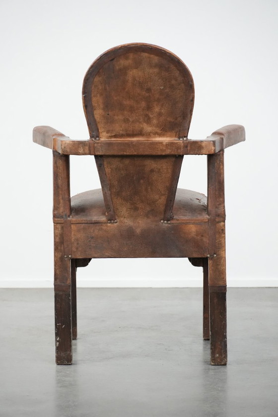 Image 1 of Unieke antieke schapenleren stoel/ armchair met een bijzonder Noord-Afrikaans design