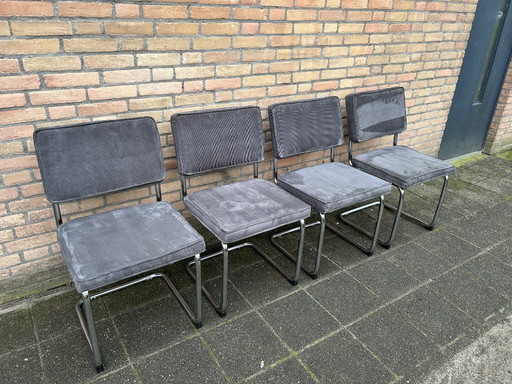 4 sedie a slitta in velluto a coste con struttura tubolare cromata