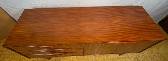 Image 1 of Mid Century Retro Teak Sideboard by Elliotts of Newbury Circa 1960  A stunning mid century modern sideboard