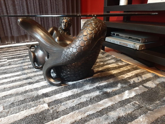 Image 1 of Bronze-colored mermaid coffee table with glass top