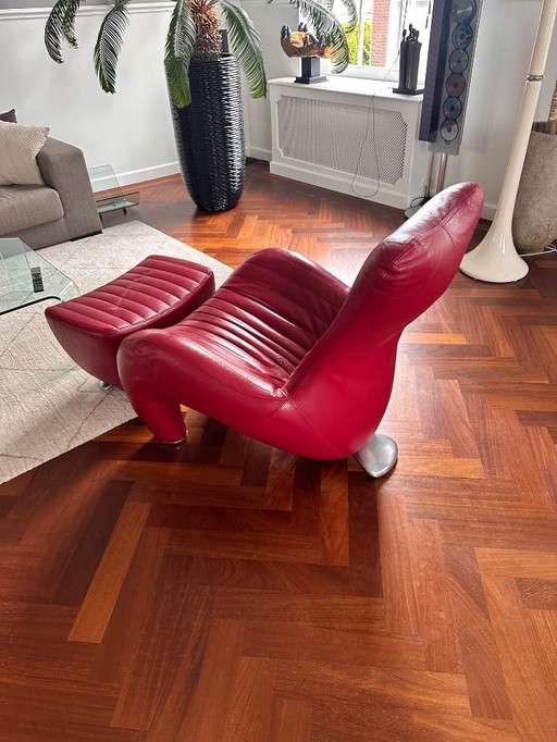 Leolux design Balou armchair with footstool in red leather