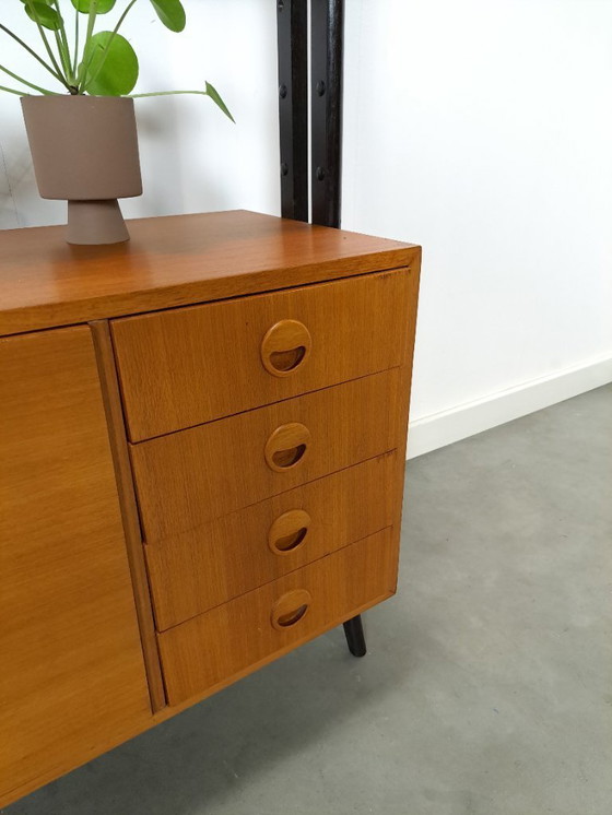Image 1 of Teak Musterring design kast met zwarte poten