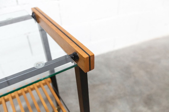 Image 1 of Serveerwagen uit de jaren 60, hifi-kast op wieltjes in teakhout, zwart metaal en glazen blad.