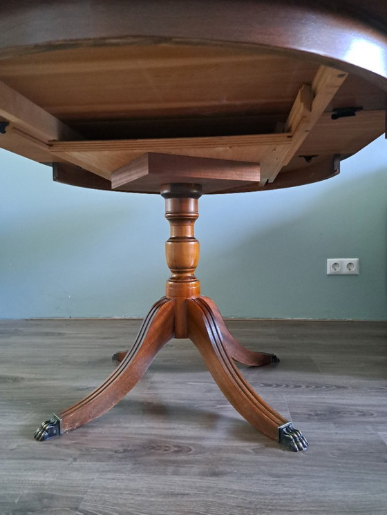 Image 1 of Mahogany dining table with brass lion legs