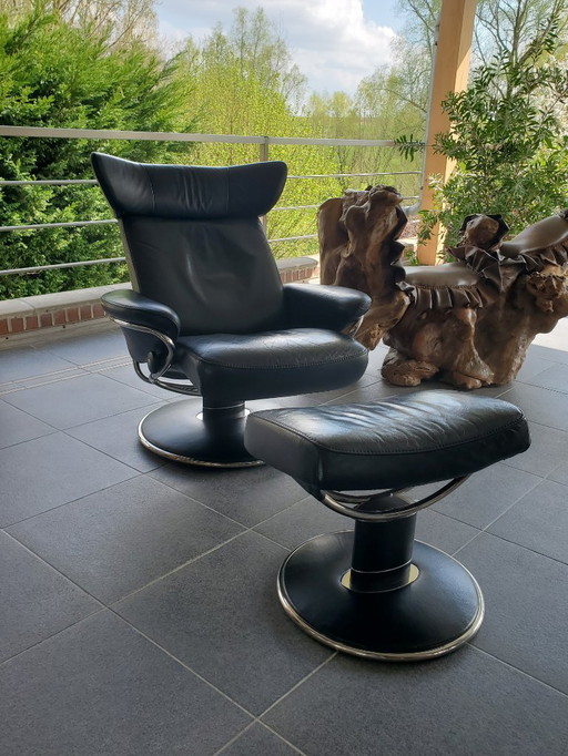 1 poltrona Stressless Jazz - Pelle nera e pouf coordinato (ref4093)