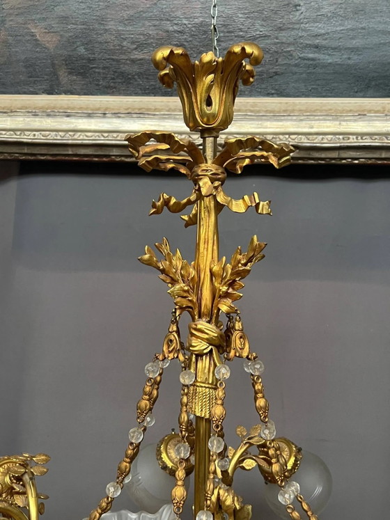 Gouden bronzen kroonluchter in Lodewijk XVI-stijl. 12 lichtpunten. (photo 5 of 8)