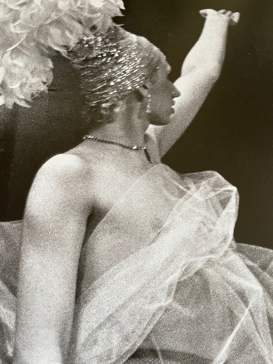 Image 1 of Nan Goldin, exibition poster  “This Will Not End Well” Naomi presenting a stage show, Boston (1973) fran The Other Side, 1992-20