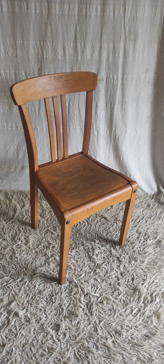 Image 1 of Chaise en bois massif par Stella - années 50/60