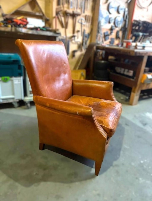 Ensemble de fauteuils/fauteuils club vintage en cuir, avec dossiers hauts et bas.