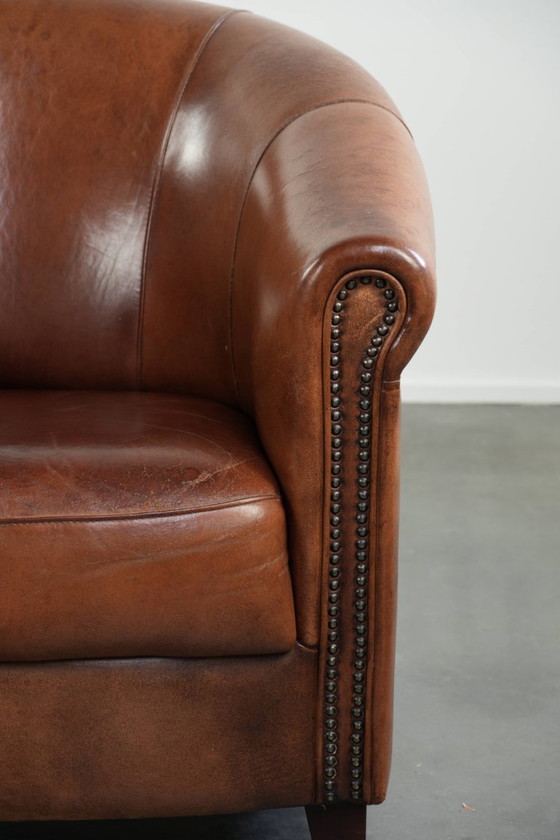 Image 1 of Mooie vintage schapenleren clubfauteuil in Engelse stijl met prachtige diepe kleuren