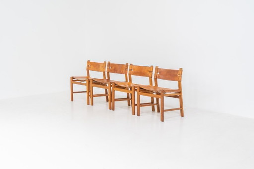 Eikenhouten en lederen eetkamerstoelen (Denemarken, jaren 60).