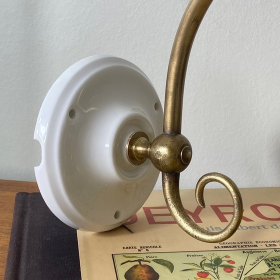 Image 1 of Brass swan-neck wall sconce with a glass paste tulip shade, signed Rethondes