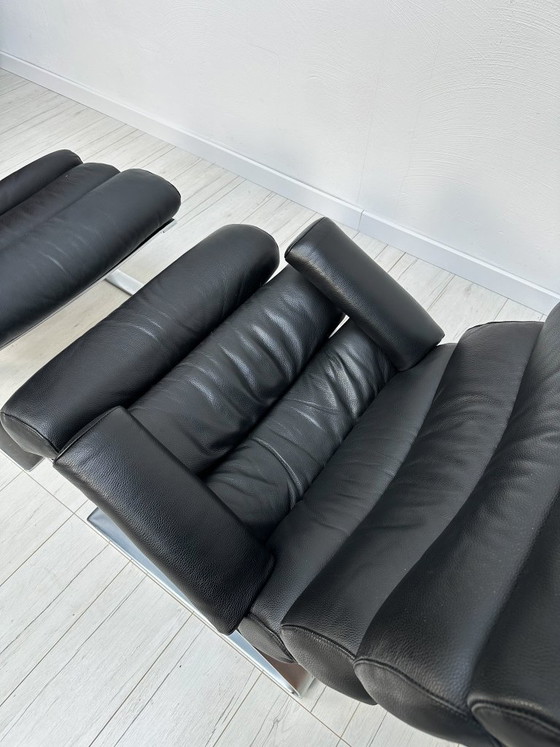 Image 1 of COR Sinus loungestoel en poef in zwart leer van Reinhold Adolf & Hans-Jürgen Schröpfer – Designicoon uit de jaren 70