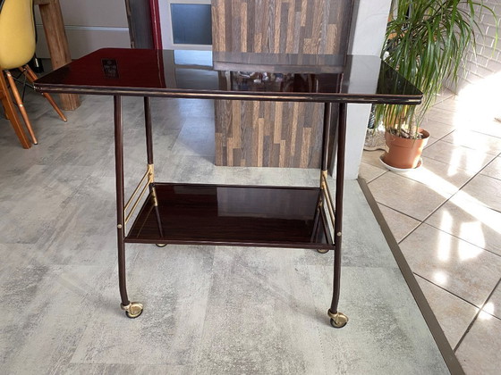 Image 1 of Meuble de télé à roulettes 2 plateaux formica marron 1960