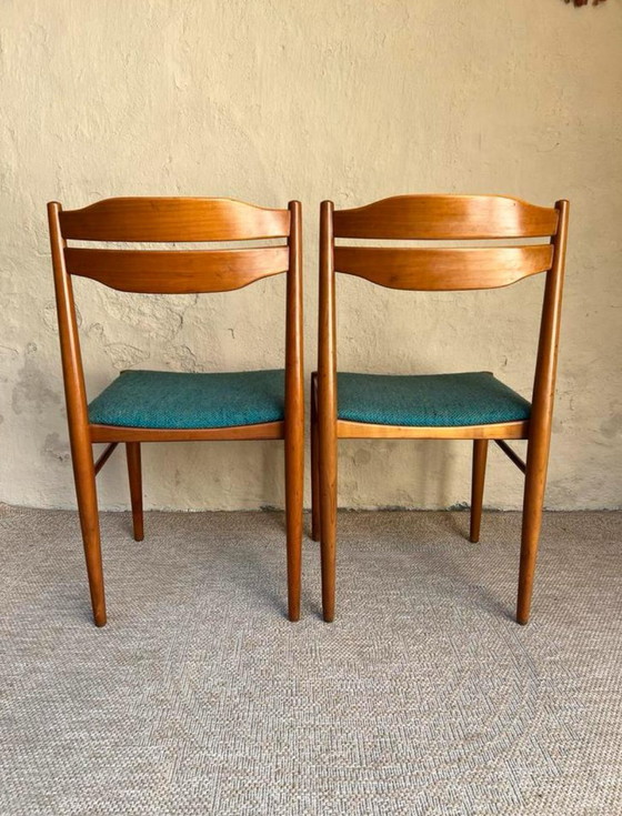 Image 1 of Deux chaises de salle à manger vintage avec revêtement bleu pétrole