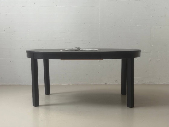 IKEA BJURSTA extendable dining table in black-brown – Wood (photo 14 of 14)