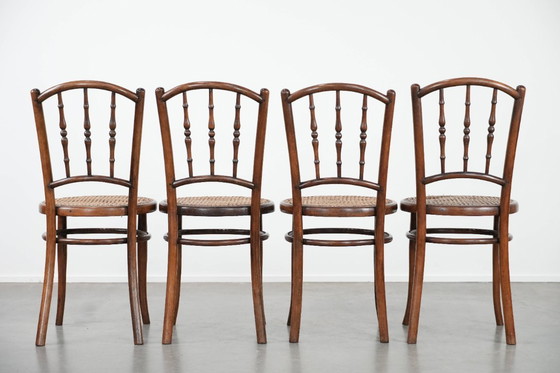 Image 1 of 4 x Wooden vintage bistro chair Jacob & Josef Kohn Wien with a wicker seat