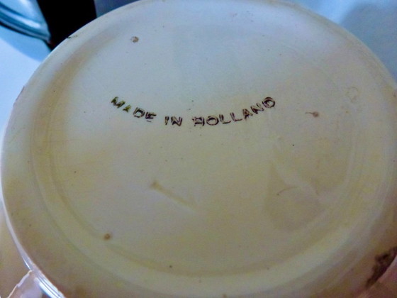 Image 1 of Ceramic Teapot with thermal Chrome casing which keeps the contents hot (or cold).