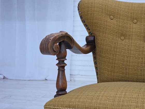 Image 1 of Deense fauteuil uit de jaren 60, originele groene meubelwol, gesneden eikenhout