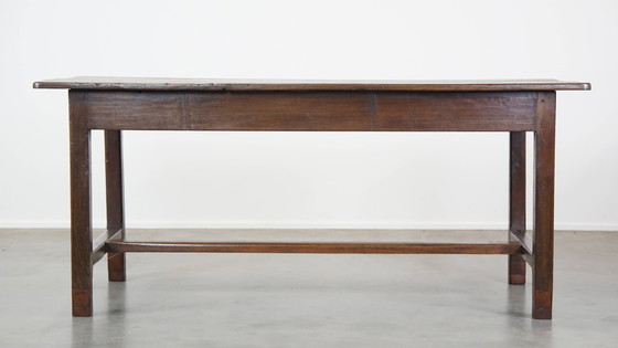 Image 1 of Antique early 19th century French dining table made of oak with 1 drawer