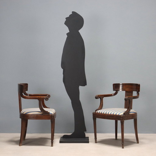 Coppia di poltrone in noce