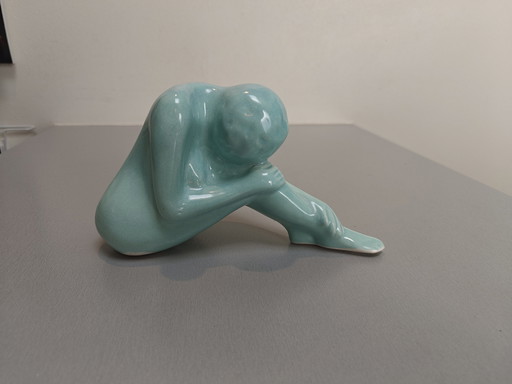 Art Deco figurine kneeling woman turquoise