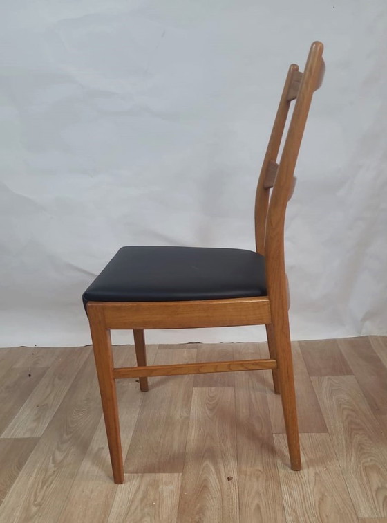 Image 1 of Vintage Danish teak chair - black leatherette seat (60's)