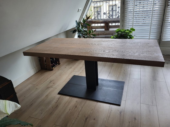Image 1 of Wooden table with cast iron leg