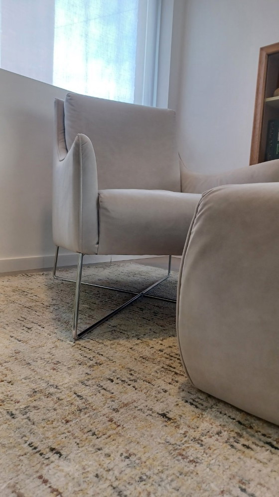 Image 1 of Natuzzi armchair with footstool