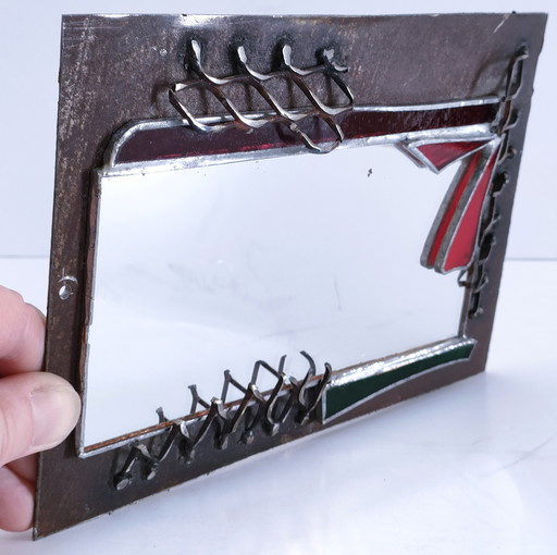 Brutalist mirror set glass and metal