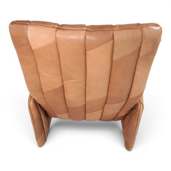 Image 1 of De Sede Ds 50 fauteuil met voetenbank, bekleed met buffelleer en patchwork, 1970
