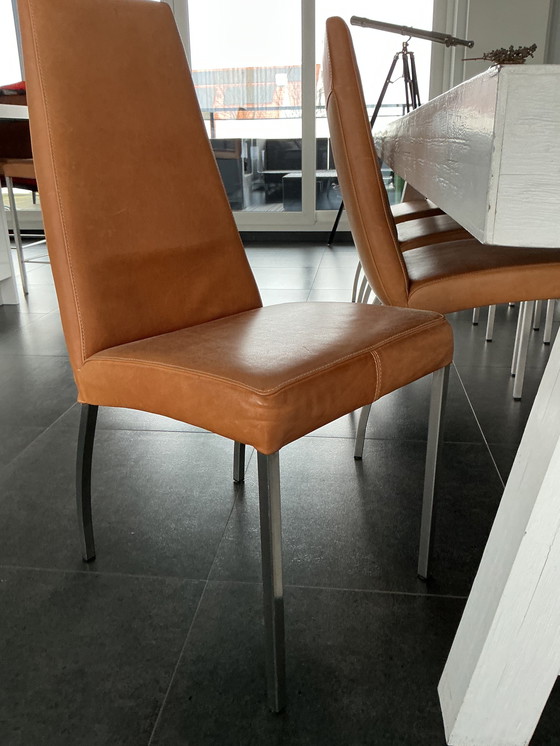 Image 1 of Sala da pranzo completa con 8 sedie in pelle, 3 sgabelli da bar e tavolino da caffè