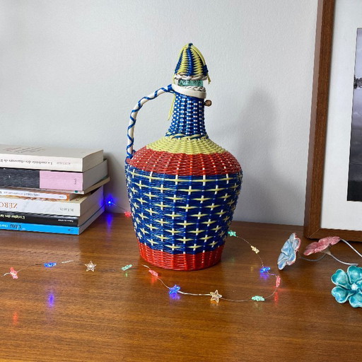 Glass bottle and vintage plastic braided scoubidou