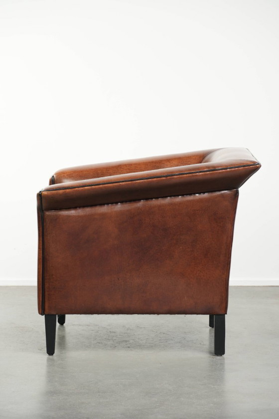 Image 1 of Sheepskin Art Deco design armchair with black piping