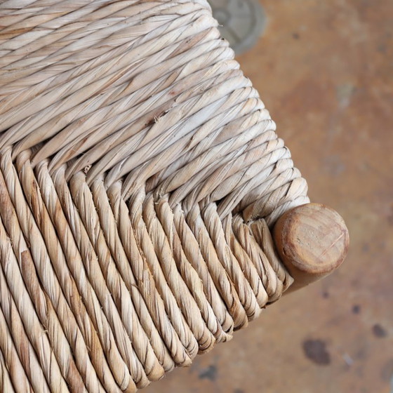 Image 1 of https://www.meutt.nl/a-109283495/fauteuils-stoelen/vintage-oud-bankje-rieten-zitting-hal/