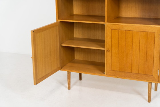 Image 1 of Eikenhouten boekenkast van Rud Thygesen & Johnny Sørensen voor HG meubelen (Denemarken, jaren 60).