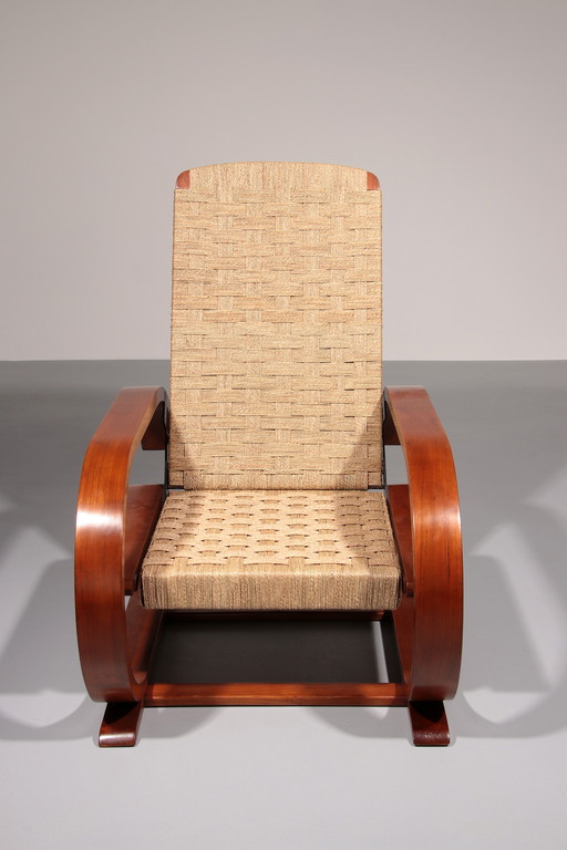 An Exceptionally Rare Mahogany Recliner Crafted in Italy During the 1950s
