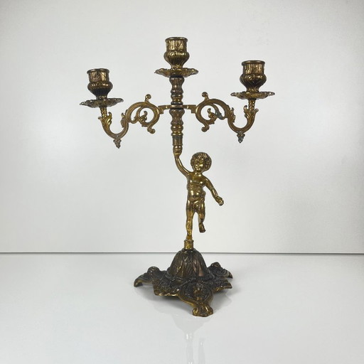 Antique three-arm candelabra in cast brass, cherub, late 19th-early 20th century