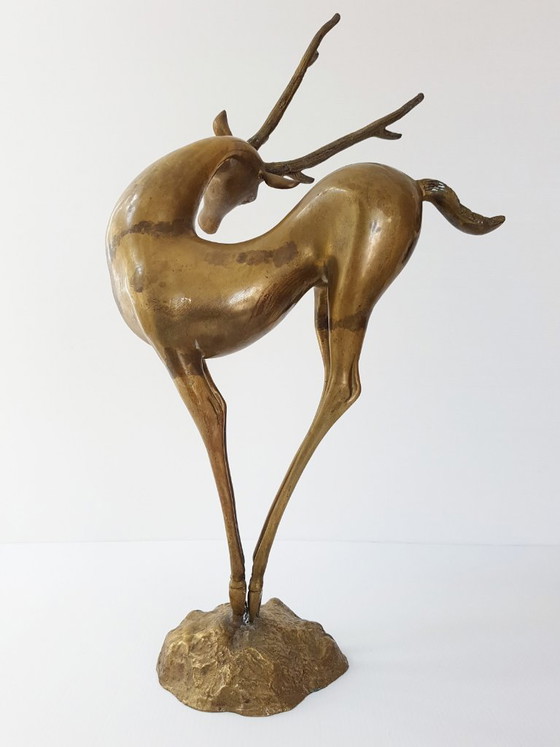 Image 1 of Important dancing stag, antelope, doe, and fawn in gilded brass, 1970s vintage 70s
