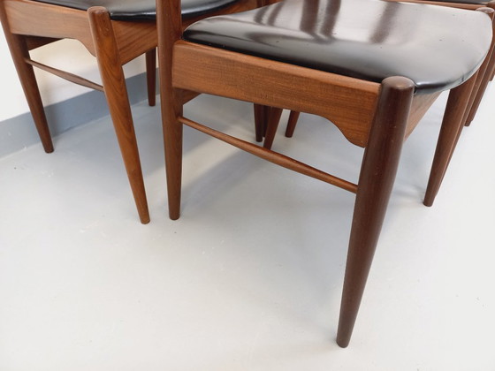 Image 1 of Set of 6 vintage Danish Scandinavian chairs by Aerthoj Jensen & Molholm in teak and skai from the 1960s