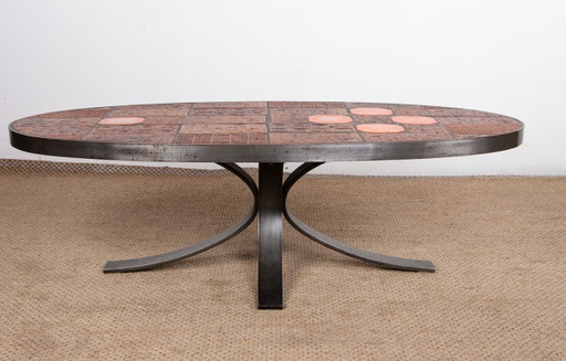 Coffee table in Lava stone, Ceramic and Steel by Jean Jaffeux 1960.