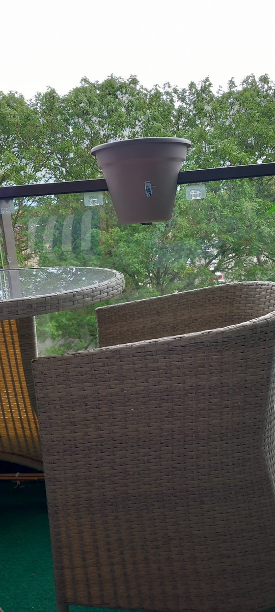 Image 1 of 2-person bistro dining area outside or inside