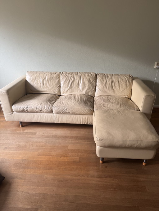 Leather three-seater sofa with footstool - Brand Touché